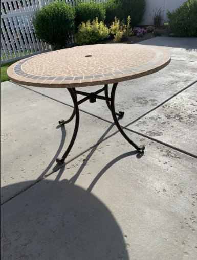 Stone Patio Table, 5 Woven Chairs, and Shade Umbrella
