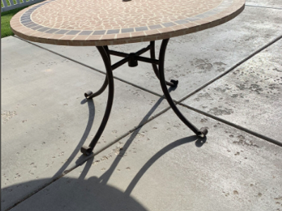 Stone Patio Table, 5 Woven Chairs, and Shade Umbrella
