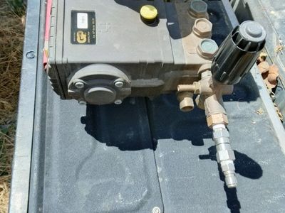 General pump pressure washing pump 5.6 GPM.