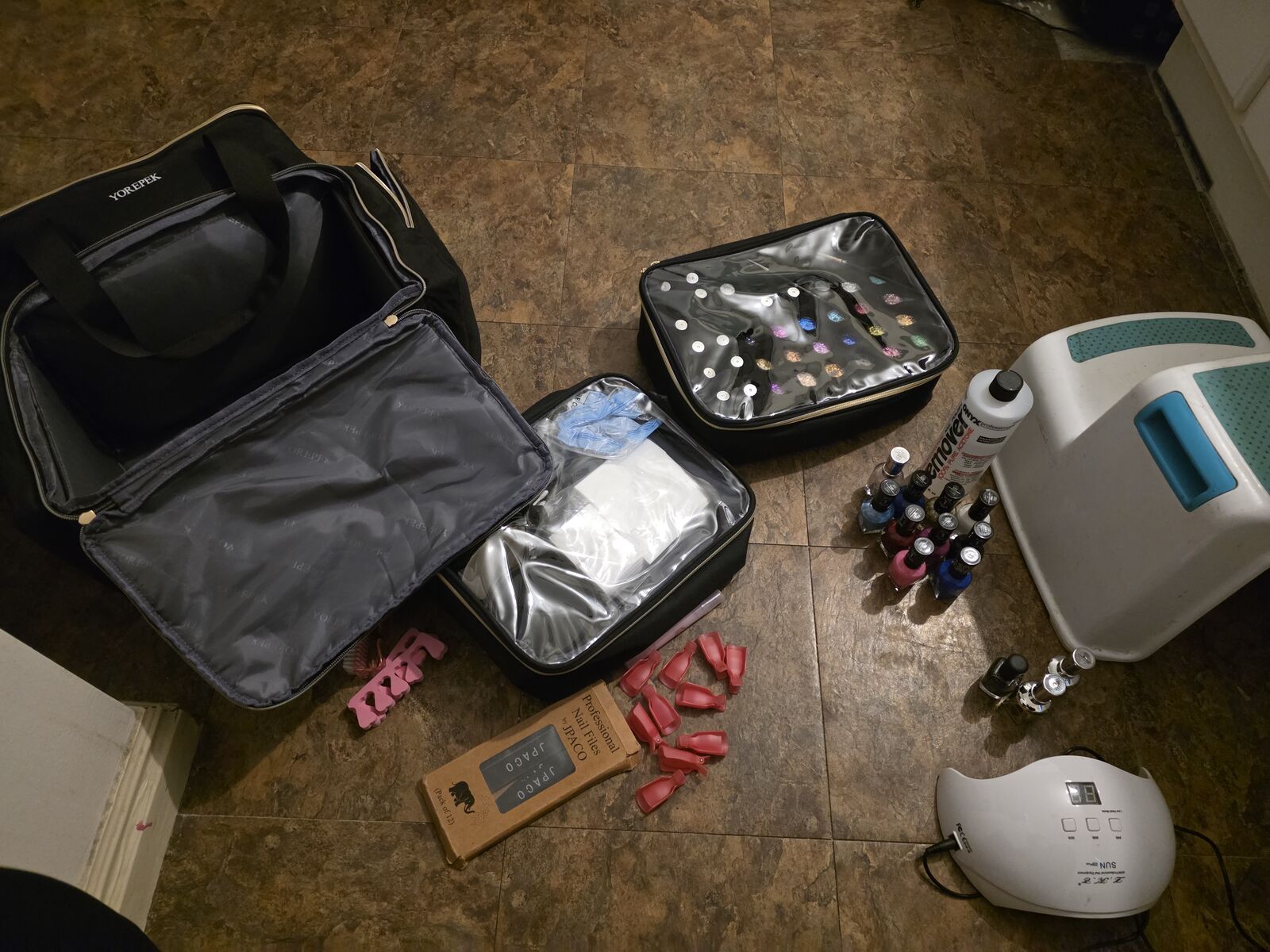 Gel Nail stuff with accessories and carrying cases