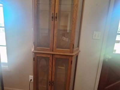 Lighted Corner Curio Cabinet – $175 OBO
