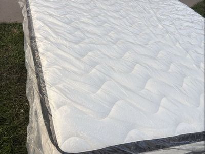 Brand new king size bed with mattress