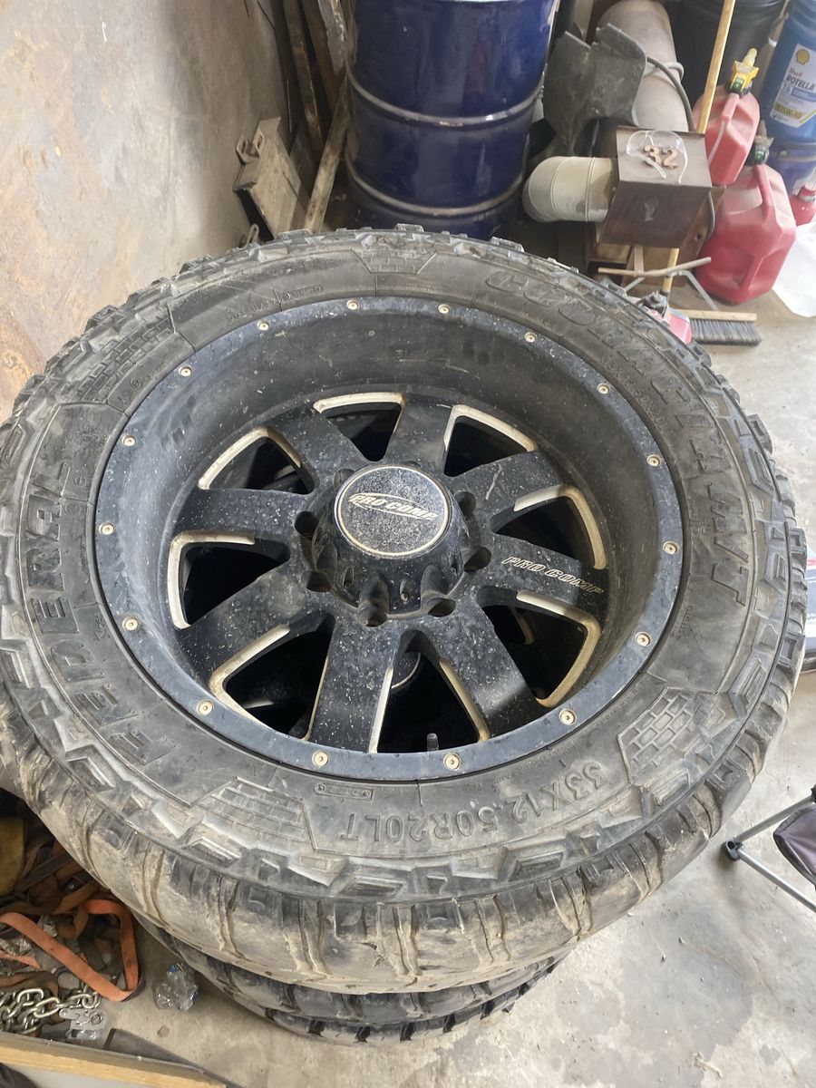 Used AMP Terrain Attack M/T A 33X12.50R20LT Tire & Wheel Set (4)