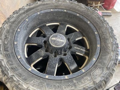 Used AMP Terrain Attack M/T A 33X12.50R20LT Tire & Wheel Set (4)