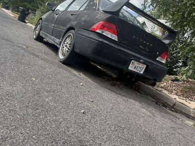 Mitsubishi Lancer Sedan - Project Car / running car just has a burnt clutch and a couple missing tubes for the engine