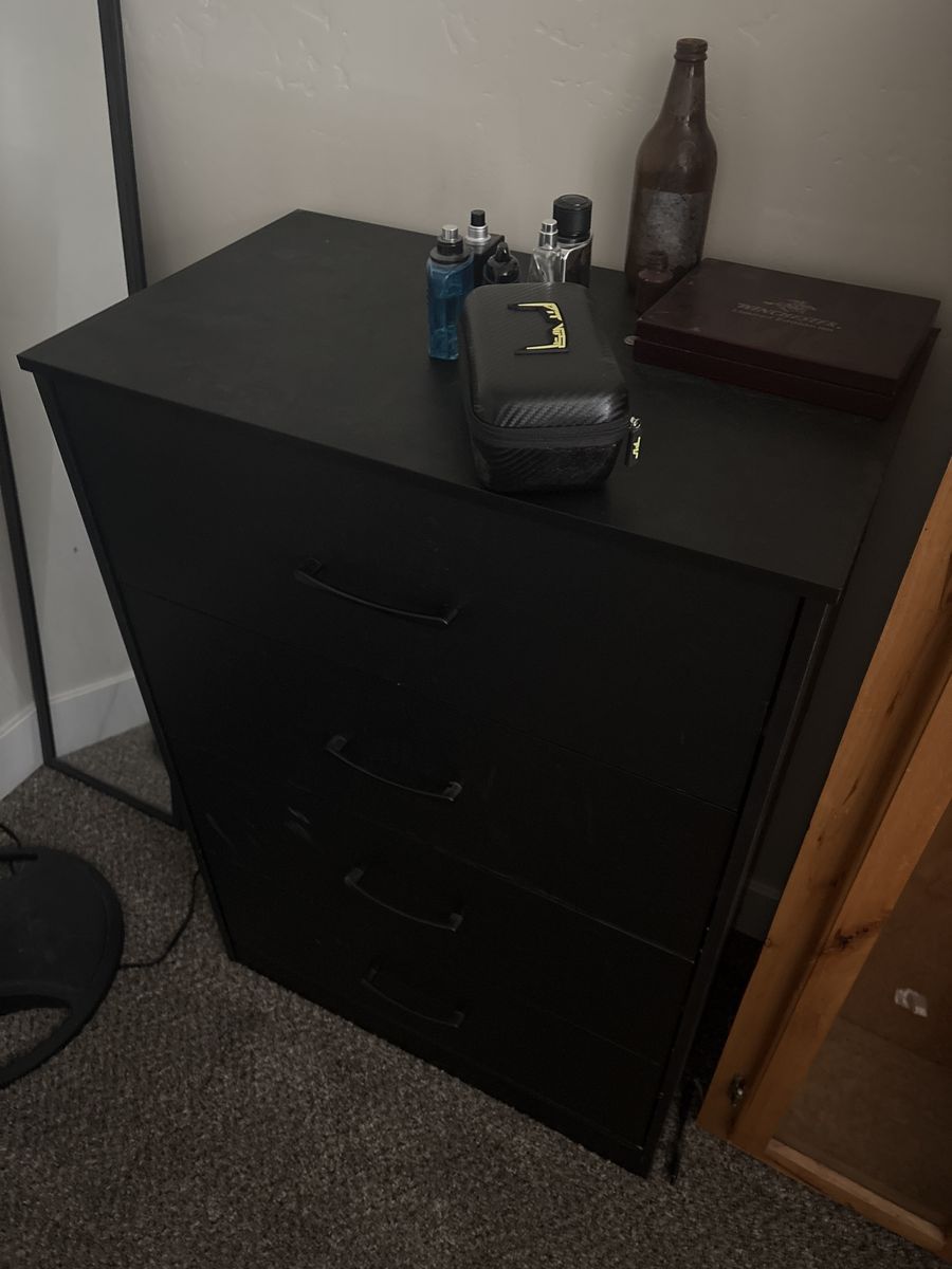 Black Wood 4-Drawer Tall Dresser - Excellent Condition, Ready for Your Home!