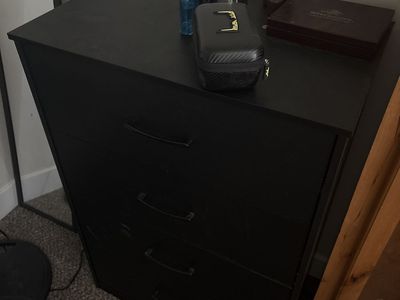 Black Wood 4-Drawer Tall Dresser - Excellent Condition, Ready for Your Home!