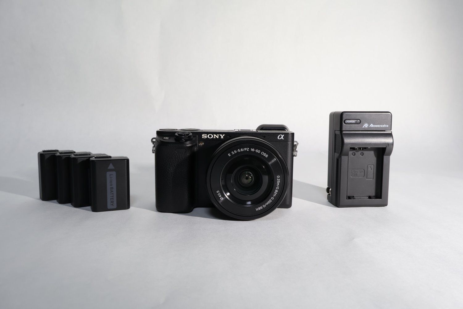 Sony Alpha a6300 Mirrorless Digital Camera with lens and 4 batteries
