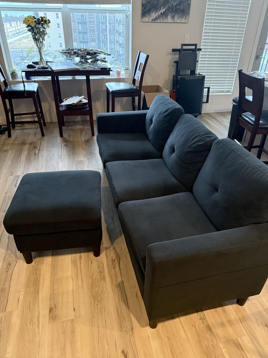 Black couch and ottoman with storage