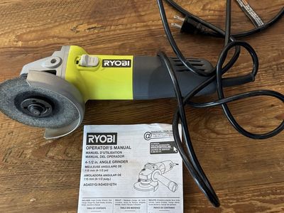 Ryobi 4 1/2” angle grinder with discs. Corded.