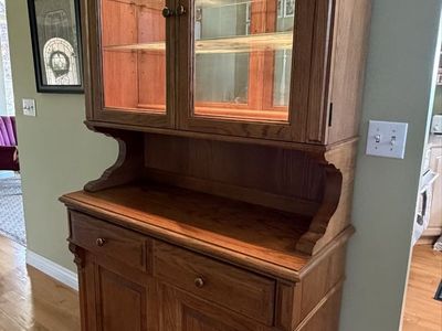 Solid Oak and Hardwood China Hutch Cabinet with Carved Details. 82” high, 44” wide, 18” deep.