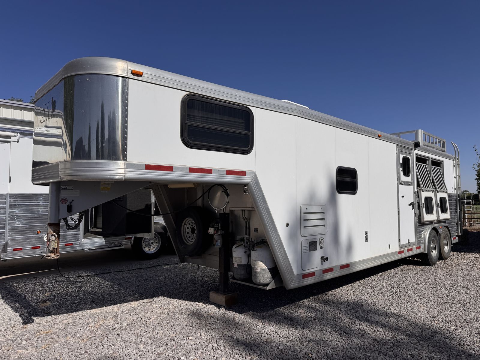2003 CM 3 horse LQ trailer with 10' SW