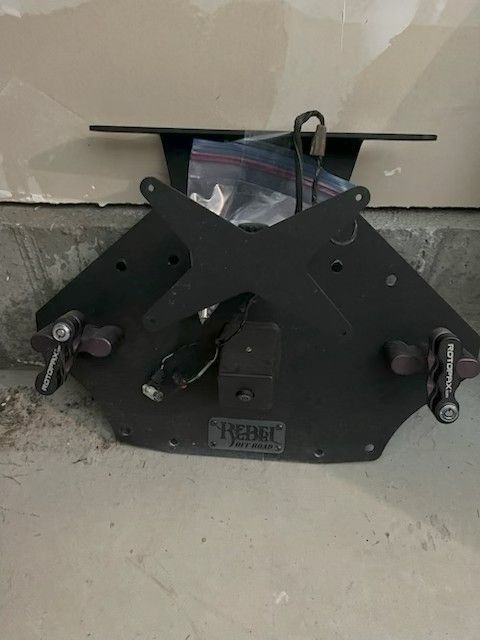 Upgrade your Jeep’s attitude AND utility with the Rebel Rear Door Gas Can Mount — only $150.00