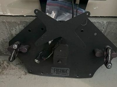 Upgrade your Jeep’s attitude AND utility with the Rebel Rear Door Gas Can Mount — only $150.00