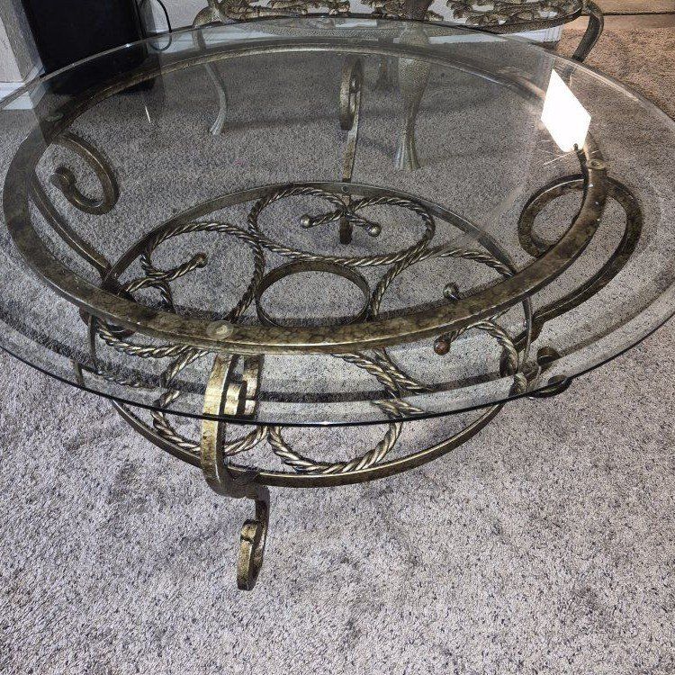 Round Glass Top Coffee Table with Ornate Metal Base
