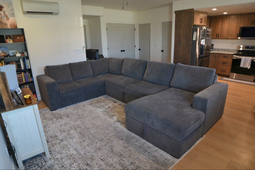 Like-New 140” U-Shaped Sectional w/ Sleeper + Stor