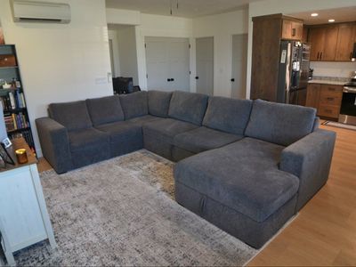 Like-New 140” U-Shaped Sectional w/ Sleeper + Stor