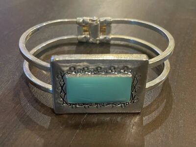 Silver Tone Hinged Bracelet W/ Light Blue Stone