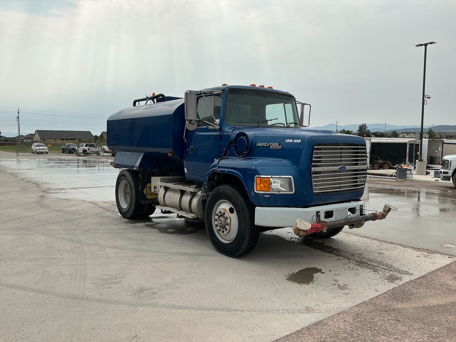 1995 Ford L9000, 2000 Gallon Water Truck Stock #10002