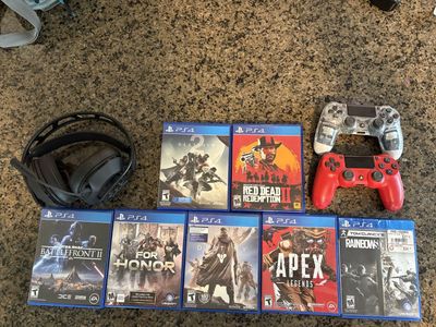 PS4 Bundle – 2 Controllers, Headset & 7 Games - $240