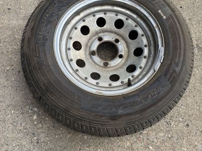 St 205/75R14 Trailer Tire on Rim - brand new tire never used. 5 lug