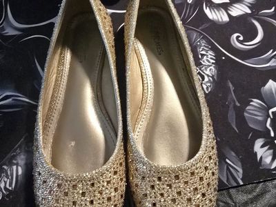 Gold glittery flats