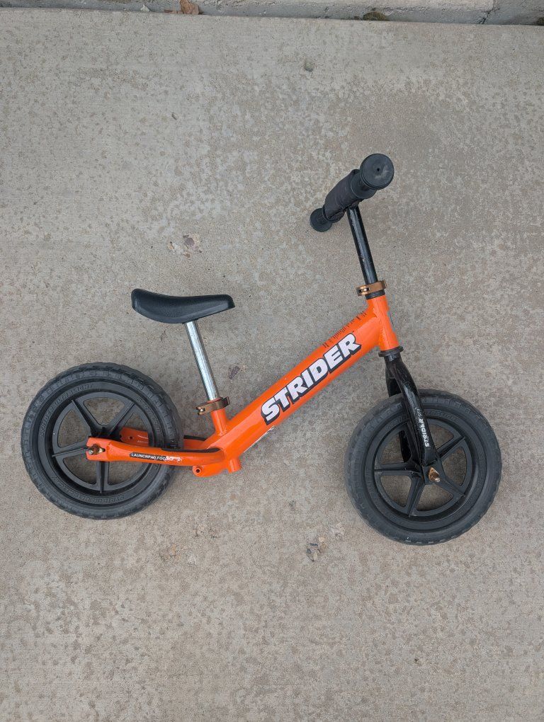 Orange Strider Balance Bike for Kids
