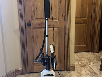 Conair portable steamer with accessory tools.