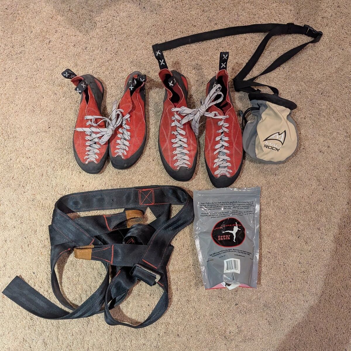 climbing shoes and harness