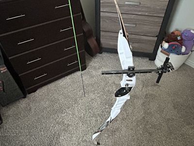 Recurve Bow with assorted arrows and sight attachment