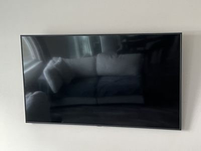 Samsung 65 inch 4K Smart TV with wall mount and tv stand