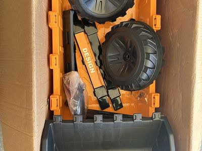 Unassembled Orange and black for a Ride-On Toy Vehicle Parts in Box trailer only