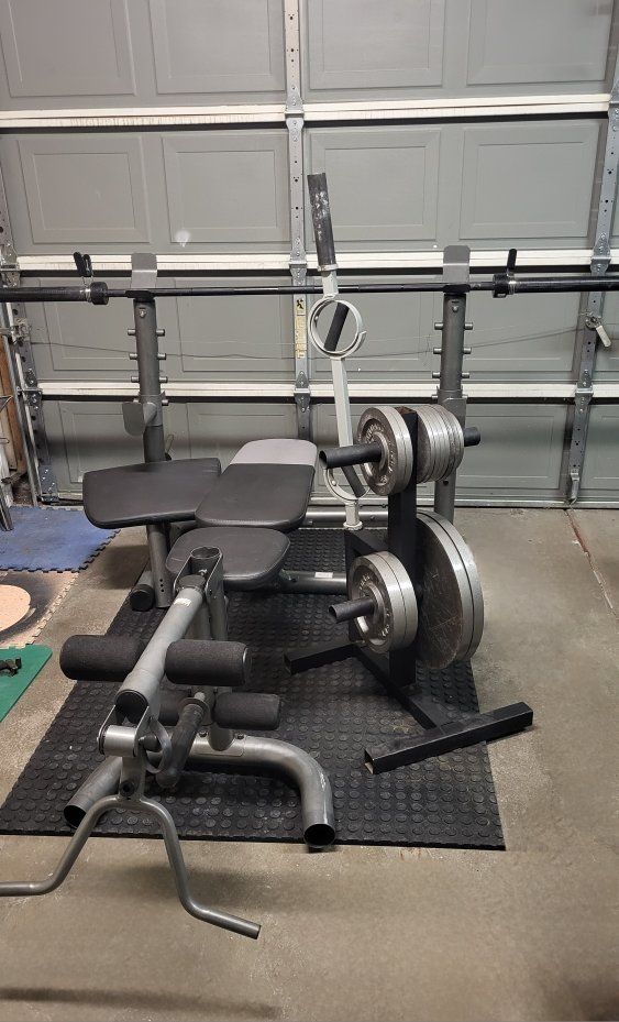 Bench and 195 pounds of weights