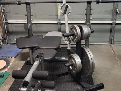 Bench and 195 pounds of weights