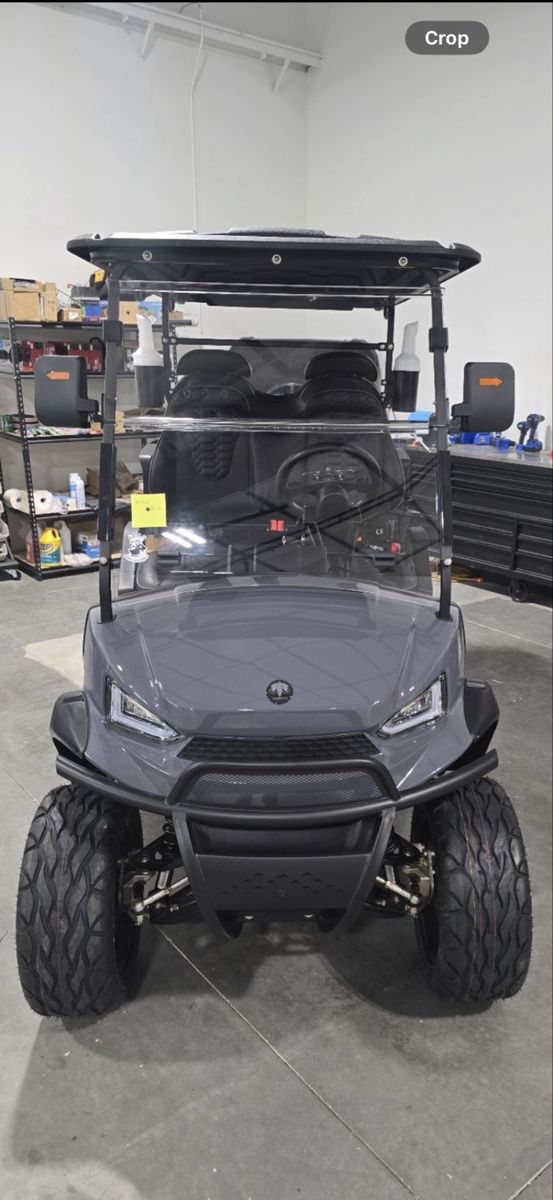 Mammoth Custom Gray Golf Cart with Black Leather Seats and Lifted Wheels