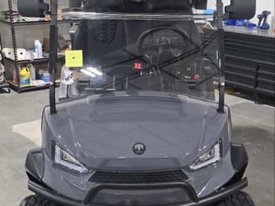 Mammoth Custom Gray Golf Cart with Black Leather Seats and Lifted Wheels