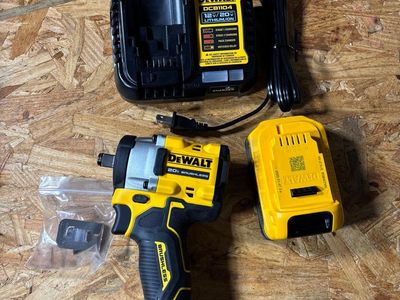 Atomic 20v max cordless brushless 1/2in variable speed impact wrench with battery and charger