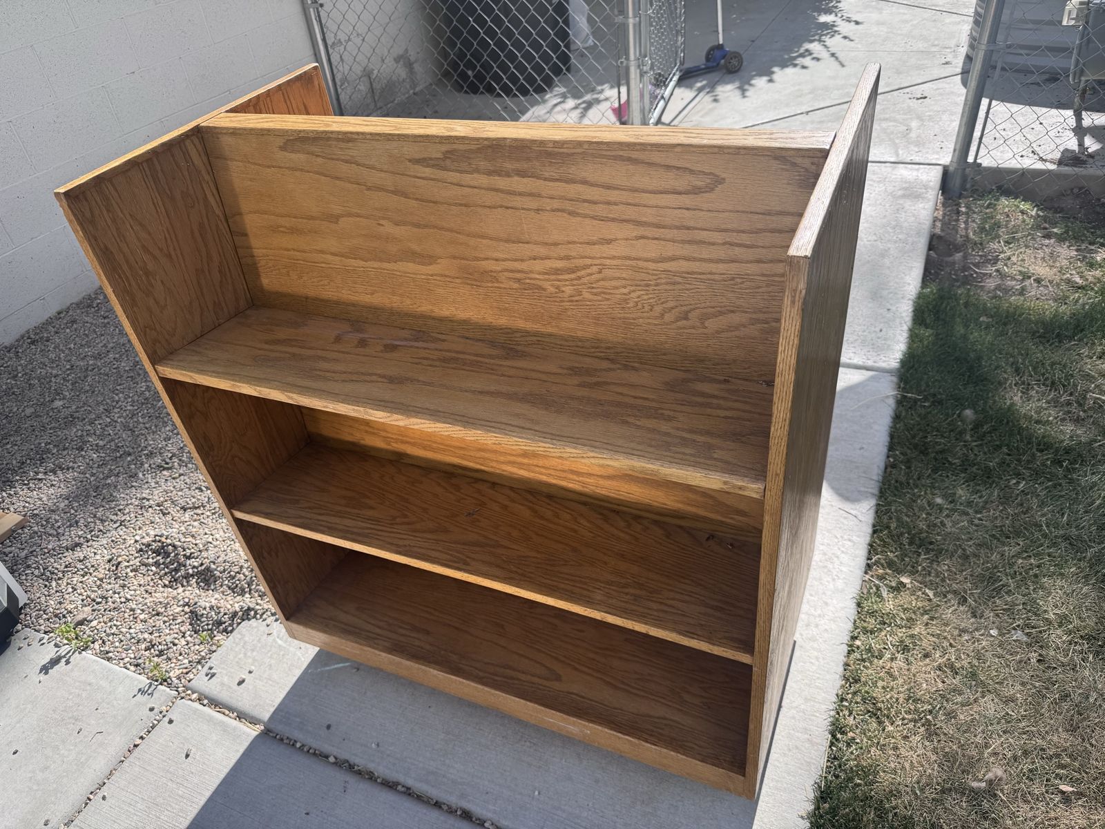 Wooden double sided shelf with wheels
