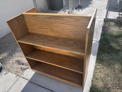 Wooden double sided shelf with wheels