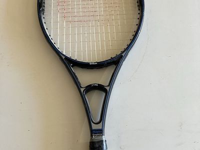 Four quality tennis rackets