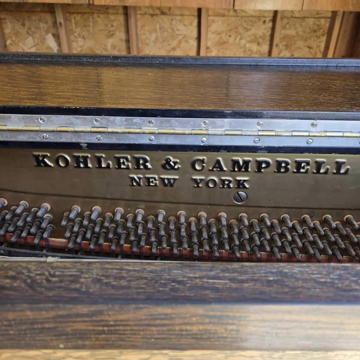 Old upright piano. Kohler@Campbell
