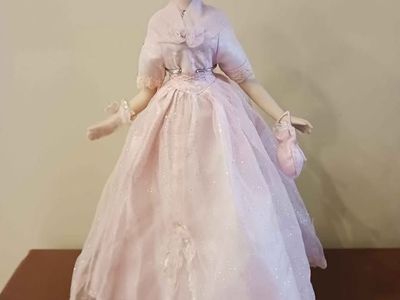 Ceramic doll in ballgown