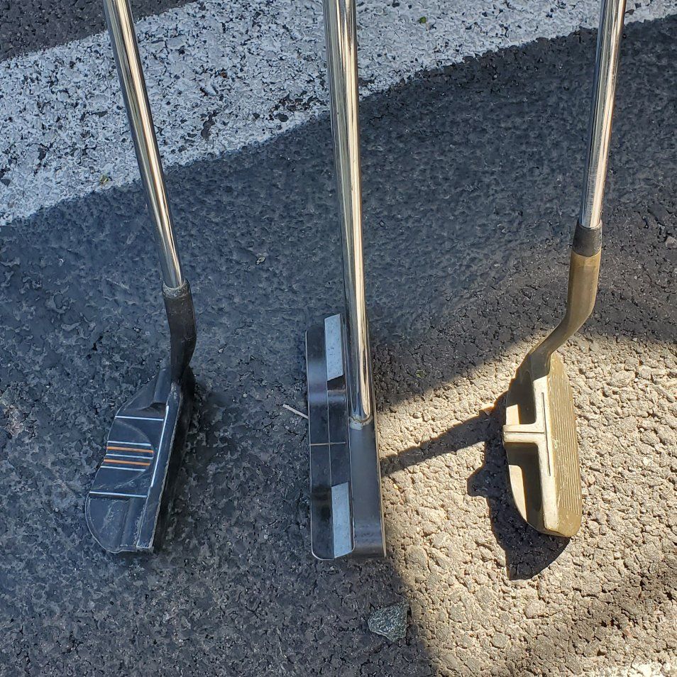 2 Golf putters and a chipper putter