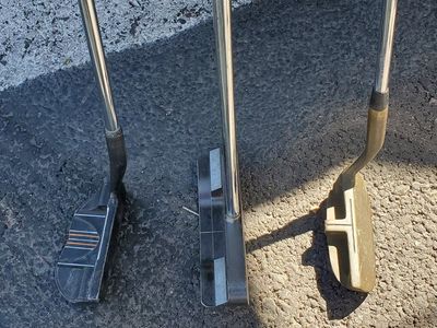 2 Golf putters and a chipper putter