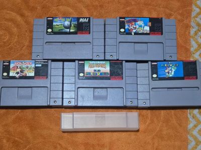 Nintendo sNes game bundle including Super Mario World! trades considered~