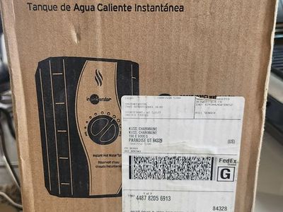 Instant hot water tank brand new in box never open