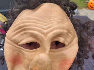 ugly man mask with curly hair