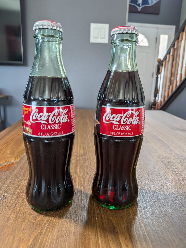 Vintage Coca-Cola Classic Christmas 1998 & Tomorrowland 1998 8oz Glass Bottles (2)