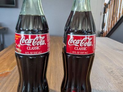 Vintage Coca-Cola Classic Christmas 1998 & Tomorrowland 1998 8oz Glass Bottles (2)