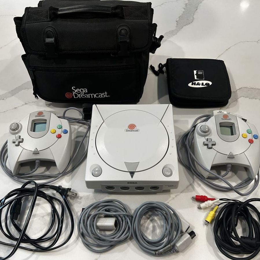 SEGA Dreamcast Bundle - 2 Controllers, 2 VMUs, 2 Jump Packs, 12 Games & Carrying Bag